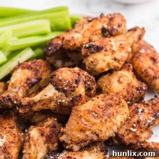 A plate of the recipe with celery sticks.