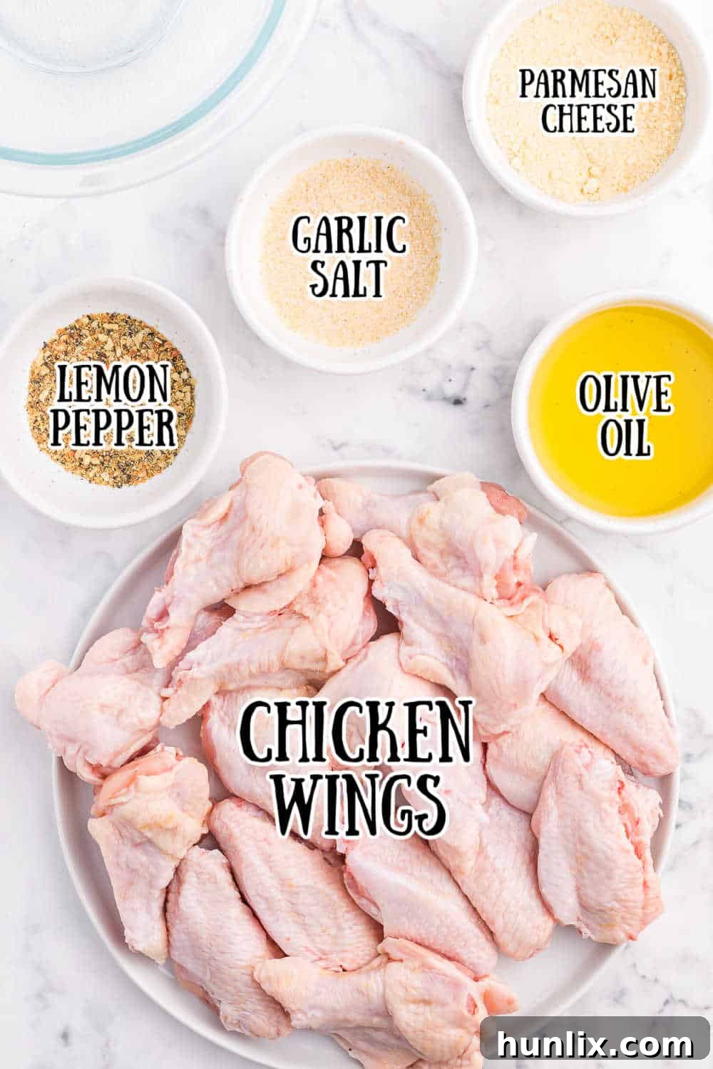 Ingredients on a white marble background.