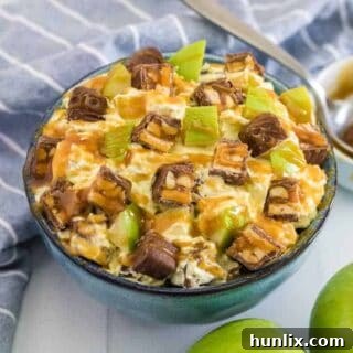 The delicious Snickers Salad displayed in a serving bowl.