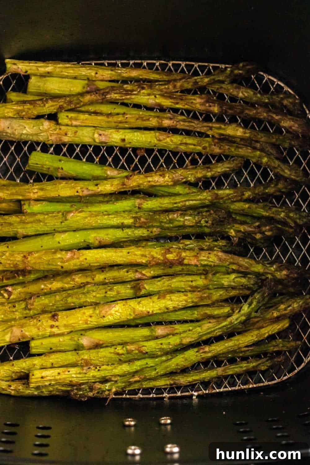 The air fryer asparagus recipe cooked and ready to serve.