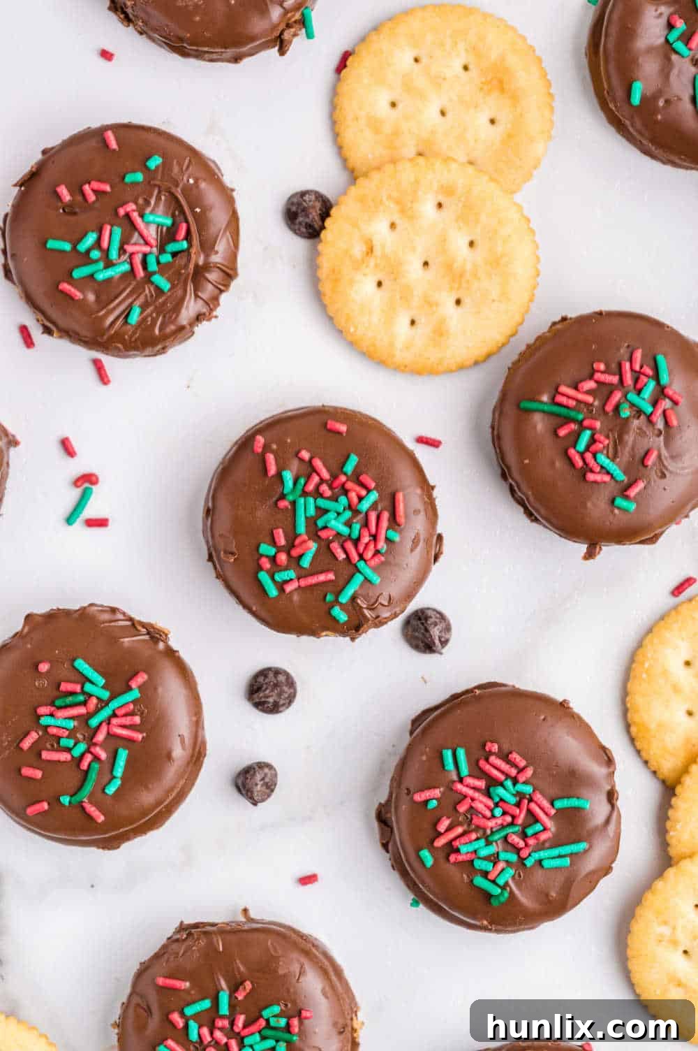 Ritz Cracker Delights 11 A close-up shot of Ritz Cracker cookies neatly arranged on a white surface, ready to be enjoyed.