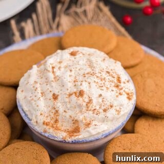 Eggnog Dip in a serving bowl with cookies