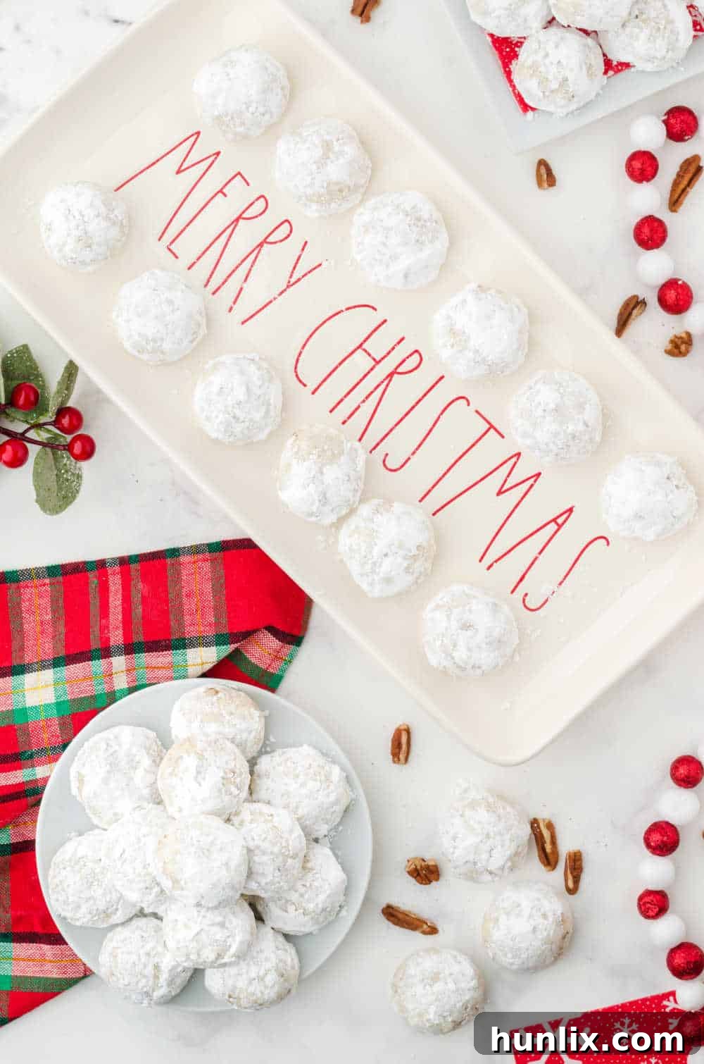 snowball cookies on a christmas platter