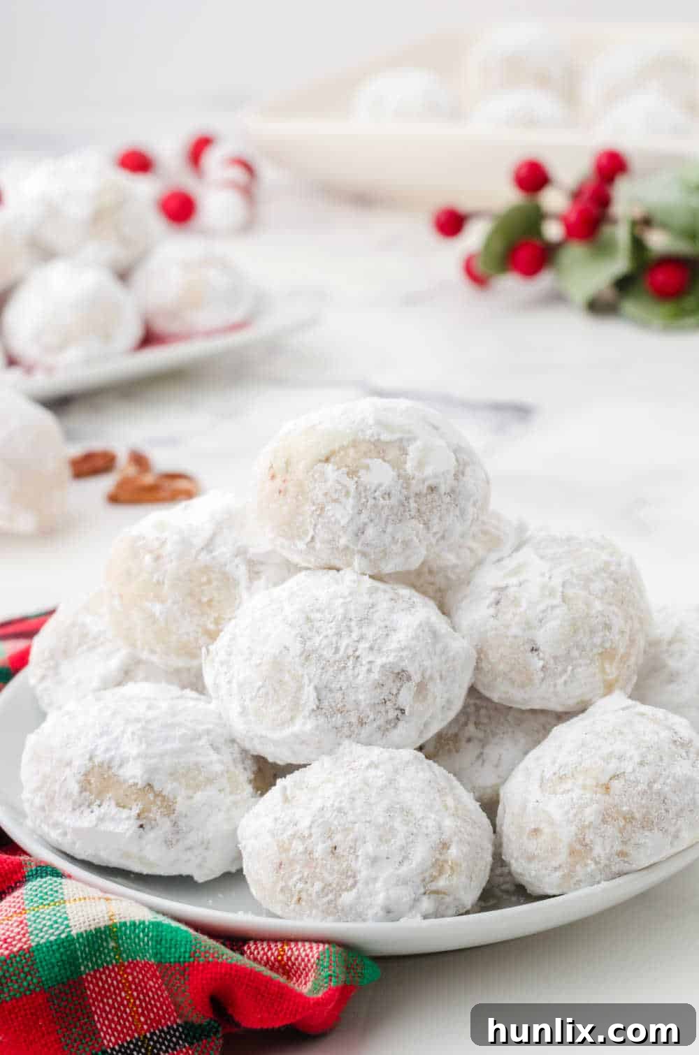 snowball cookies on a plate
