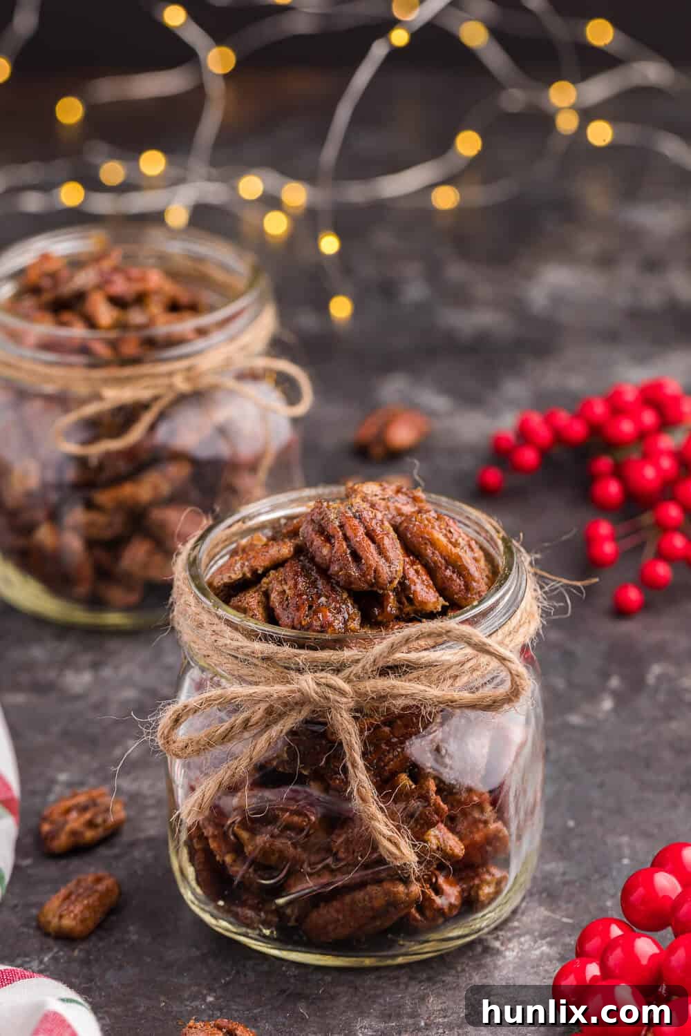 A beautifully presented jar of air fryer candied pecans, ready for enjoyment or gifting.