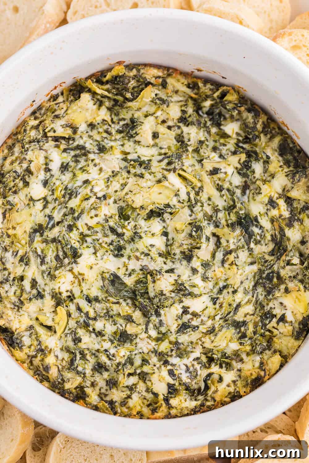 Creamy Artichoke Spinach Bliss 6 spinach artichoke dip in a bowl