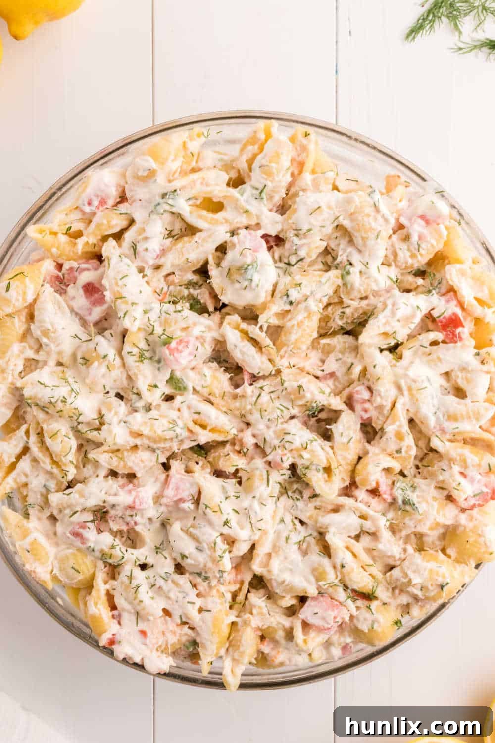 Zesty Shrimp Pasta Salad 2 A beautiful bowl of creamy shrimp pasta salad, ready to be served at a summer gathering.