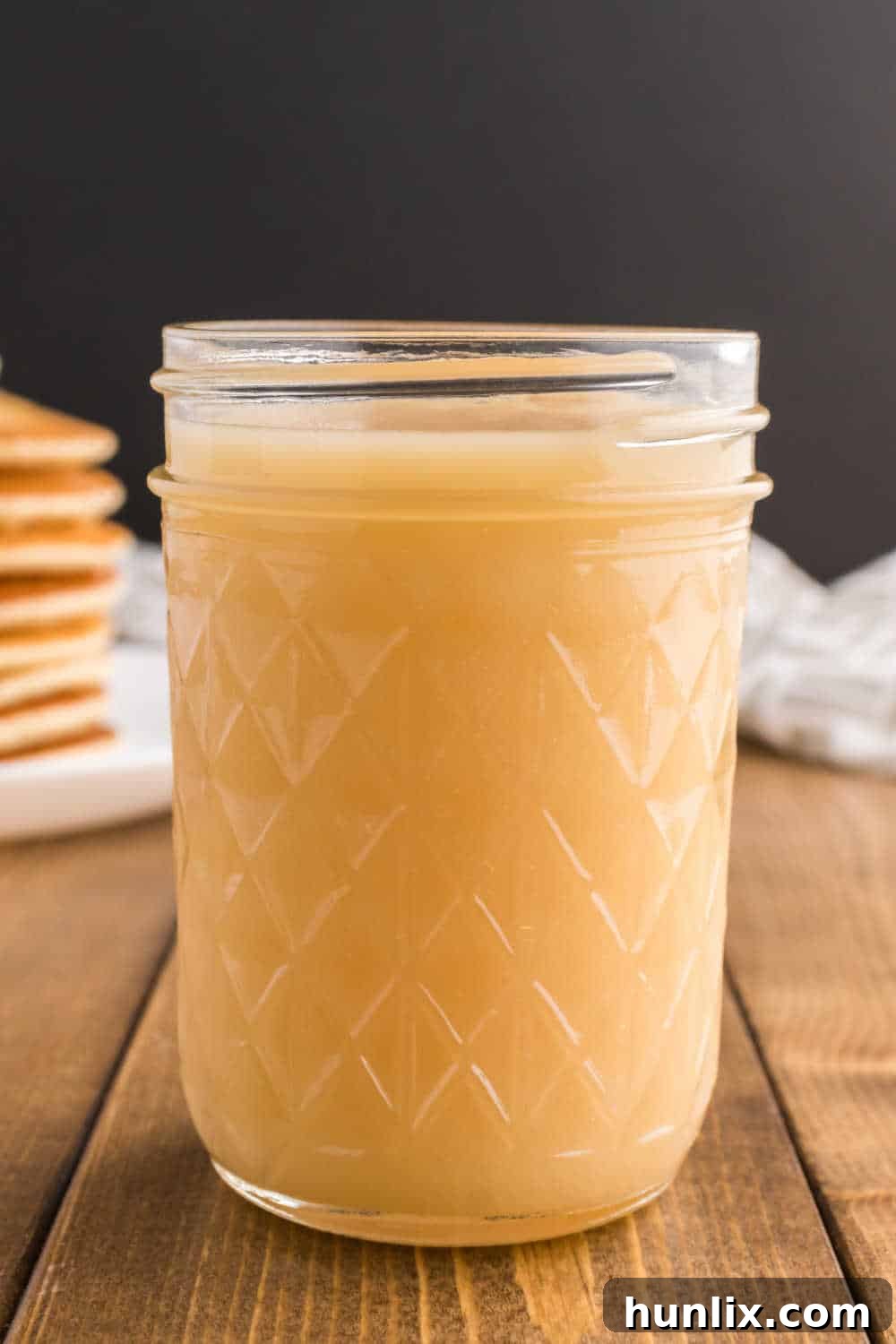 Golden Pancake Drizzle 2 A mason jar of homemade pancake syrup.