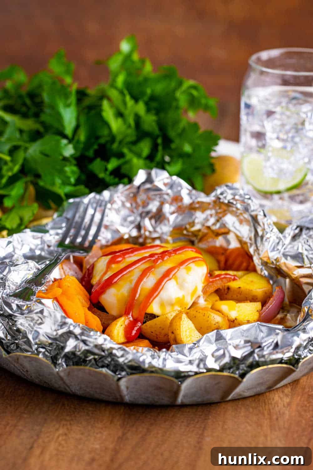 Fireside Burger Pockets 11 Burger Hobo Packet with a fork.