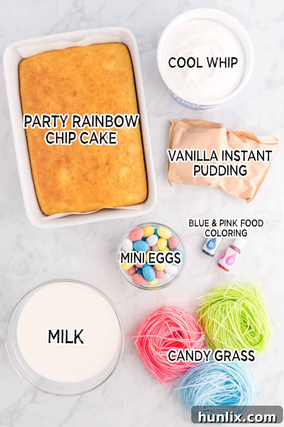 Ingredients for Easter Trifle laid out on a white surface.
