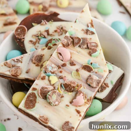 Several pieces of Easter bark served in a decorative white bowl.