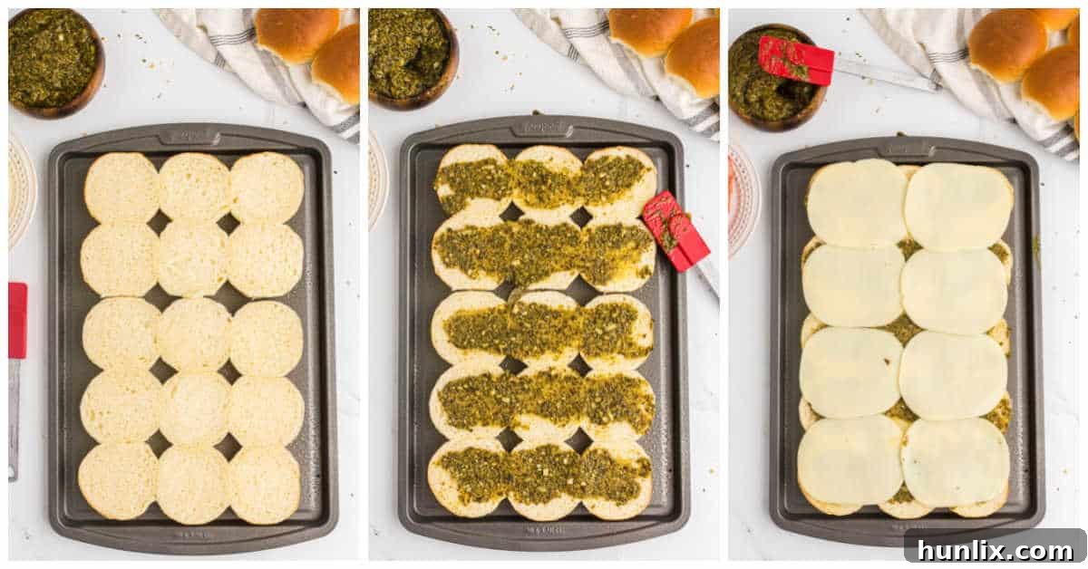 First steps of making Italian sliders, showing rolls, pesto, and cheese layers.