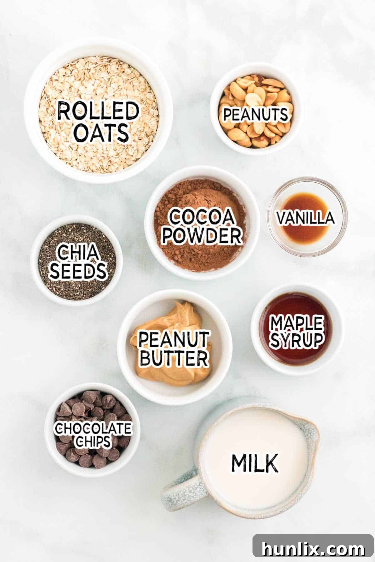 Dreamy Chocolate Peanut Butter Overnight Oats 3 Ingredients to make Chocolate Peanut Butter Overnight Oats, laid out on a surface.
