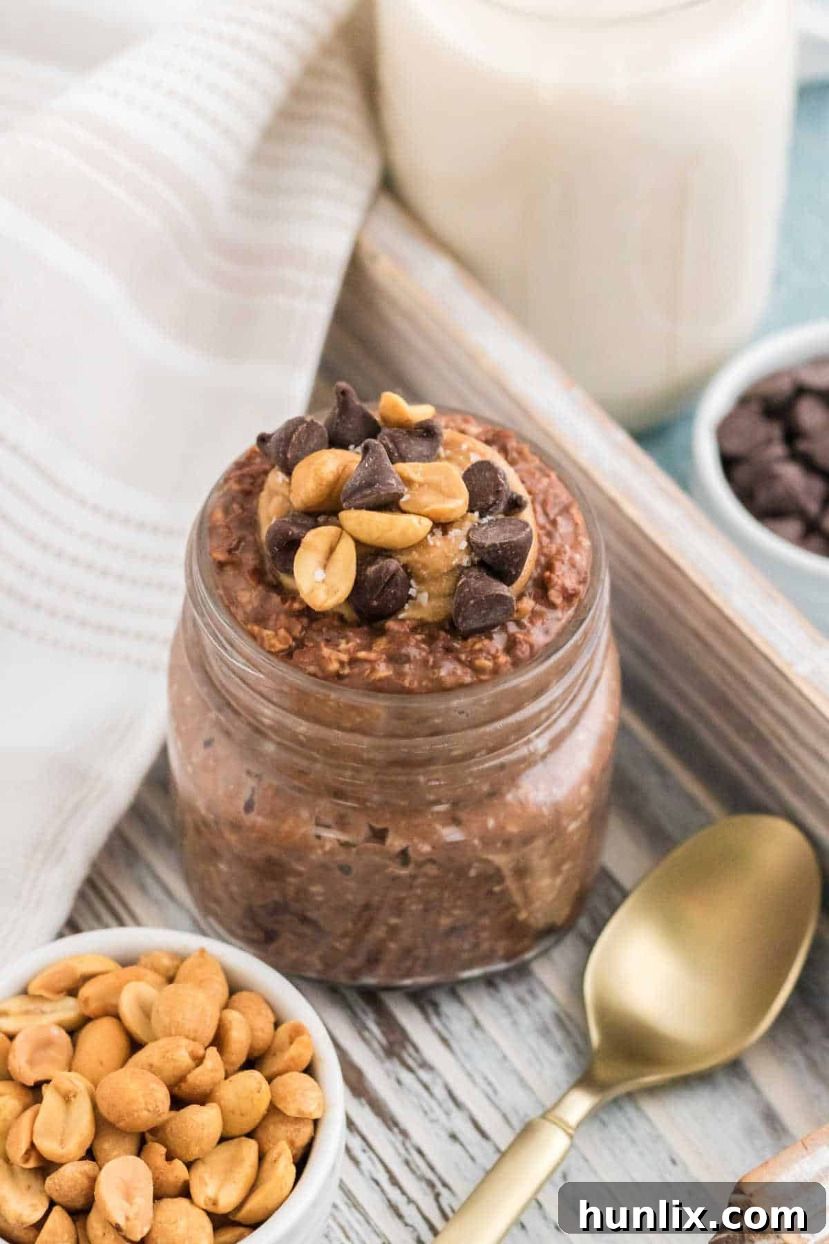 Dreamy Chocolate Peanut Butter Overnight Oats 7 A jar of chocolate peanut butter overnight oats, close up.