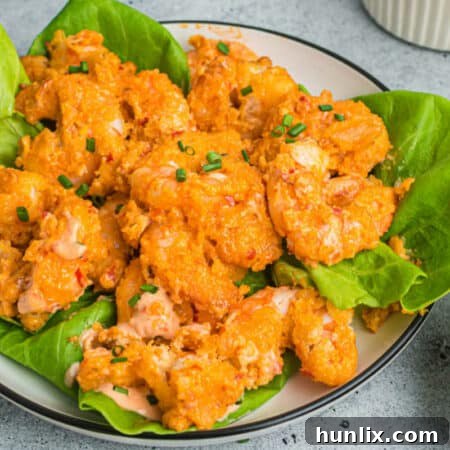 The recipe on a bed of lettuce.