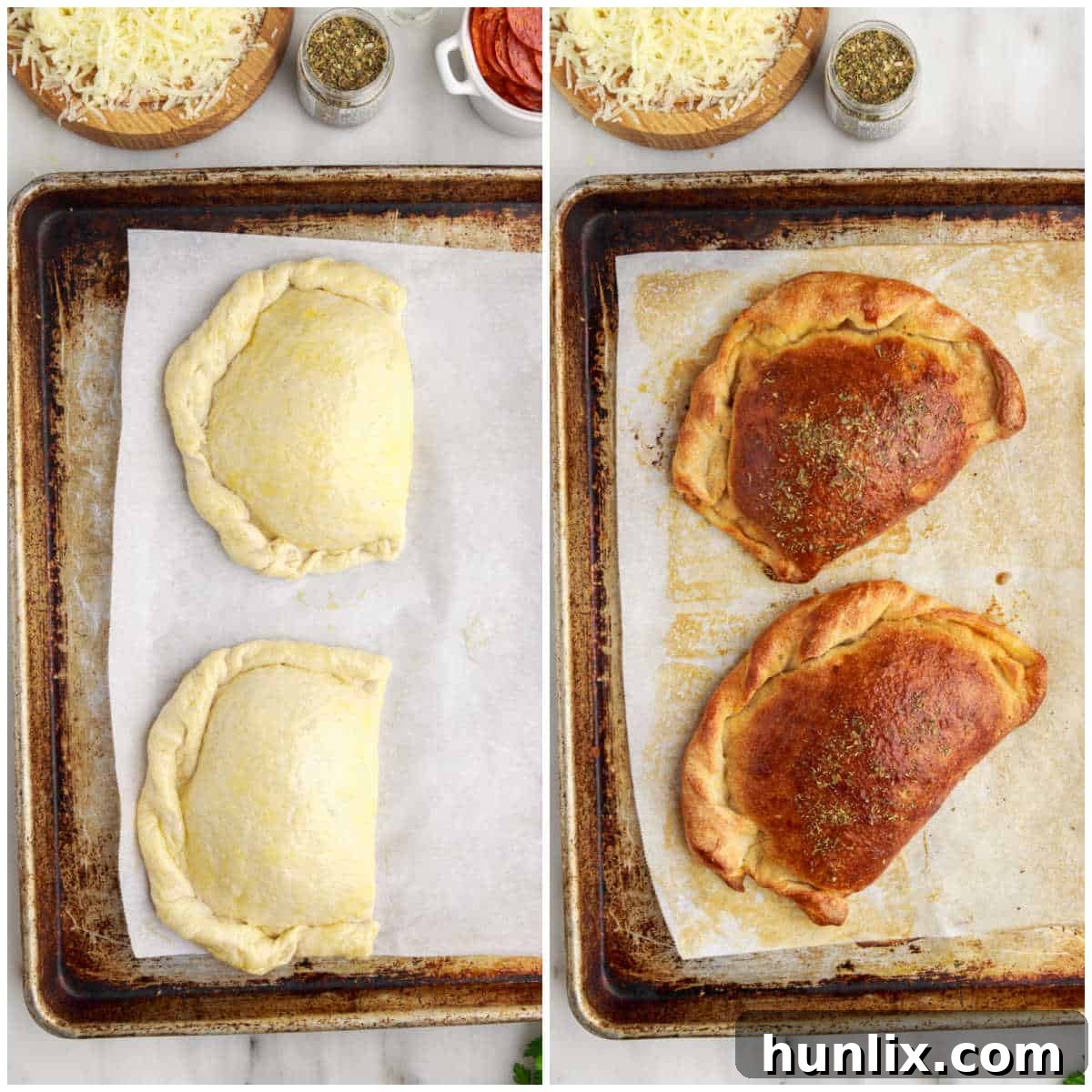 Cooked meat calzones resting on a baking sheet, displaying their golden-brown crust and perfect baked appearance.