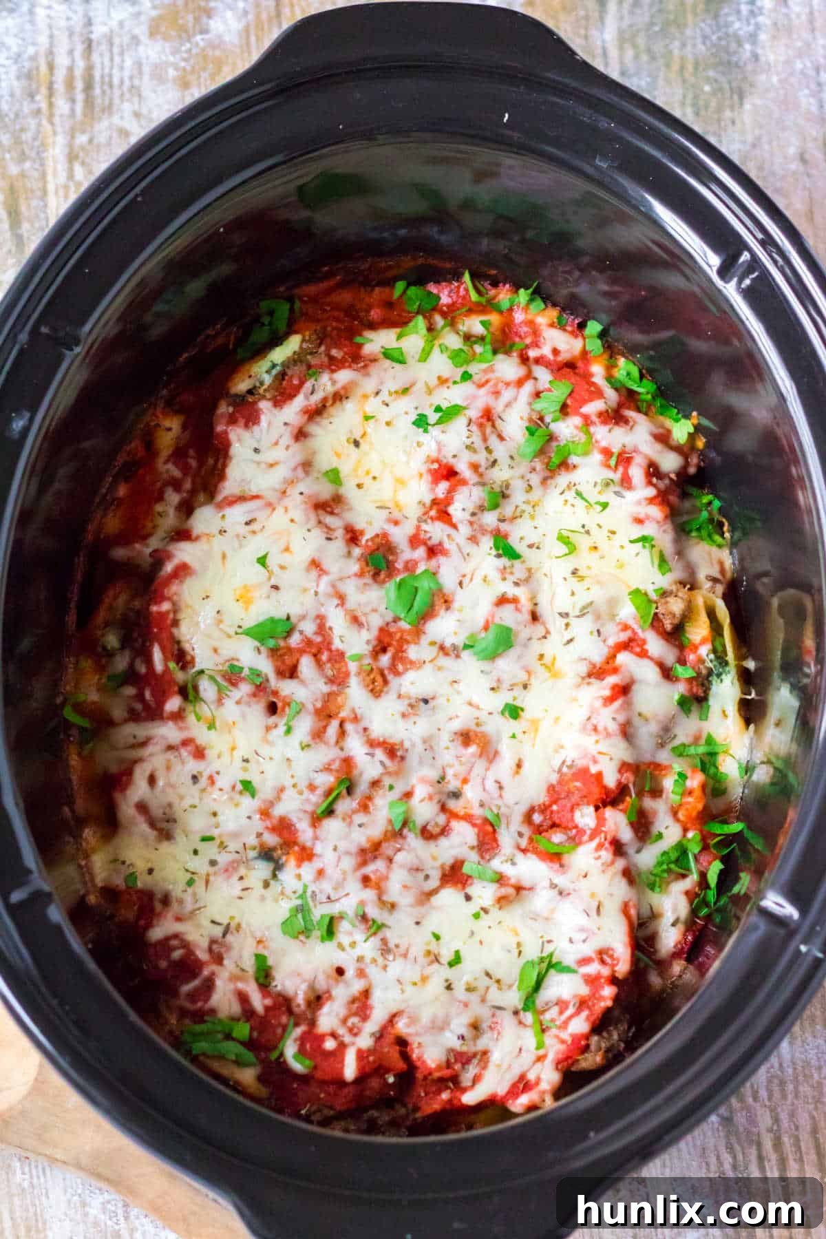 A crockpot with stuffed shells.