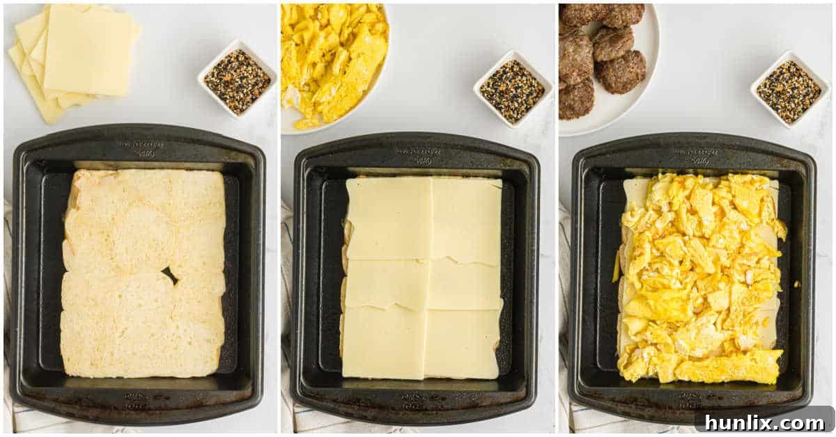 Second steps of making breakfast sliders: layering American cheese and scrambled eggs onto the sliced Hawaiian rolls in a baking dish.