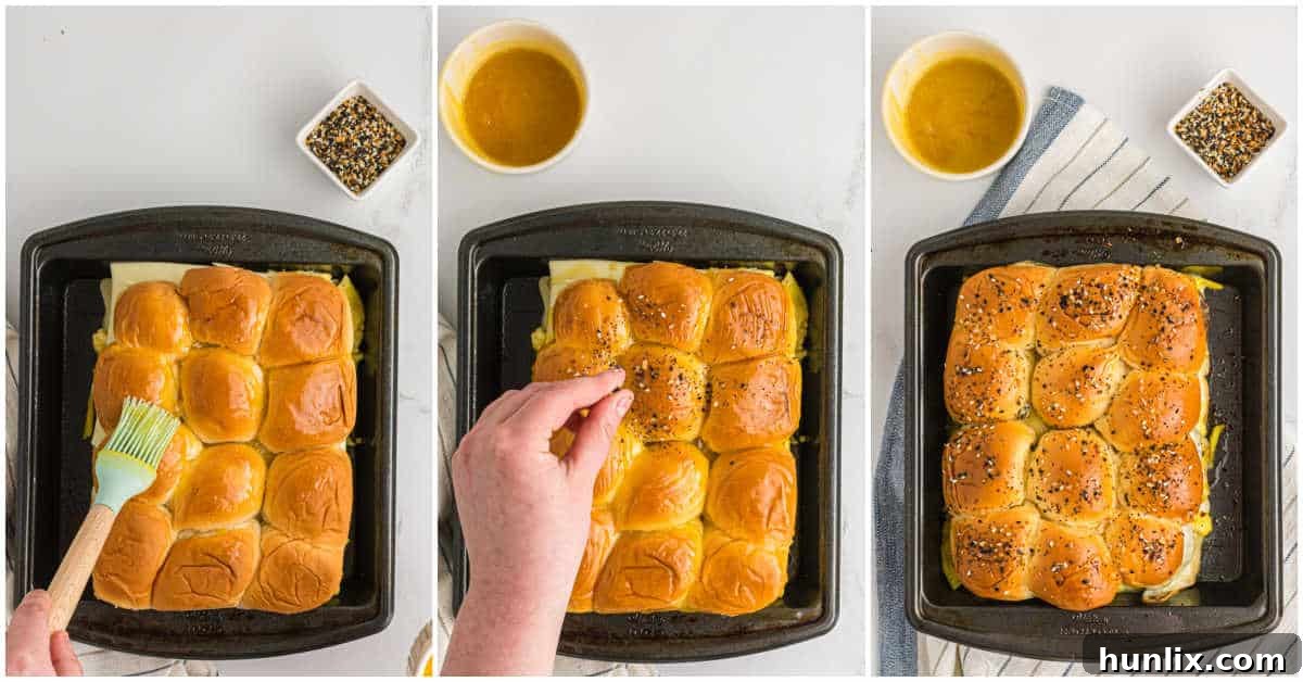 Final steps of making breakfast sliders: brushing with maple butter glaze, sprinkling with everything seasoning, and baking until golden and cheesy.