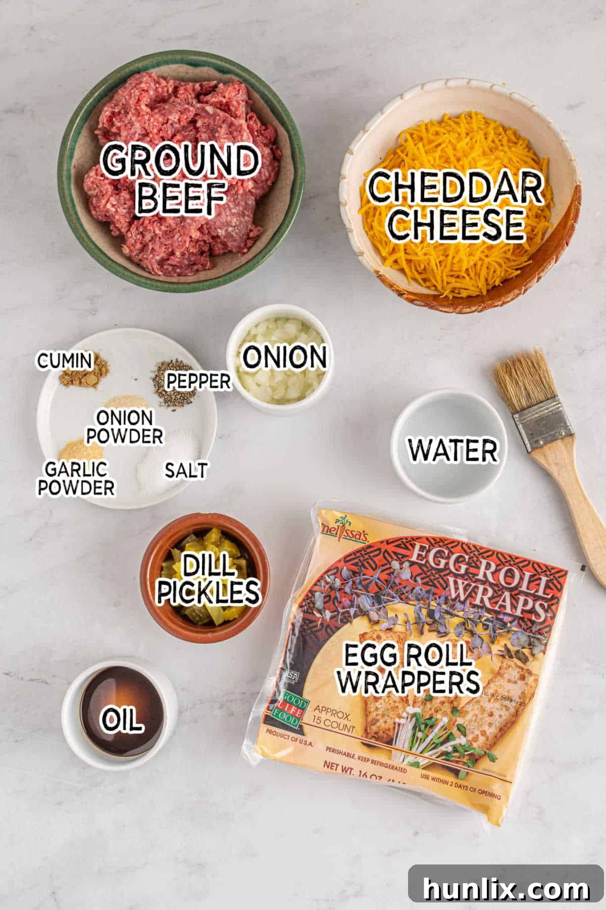 Crispy Cheeseburger Bundles 3 Ingredients to make cheeseburger egg rolls.