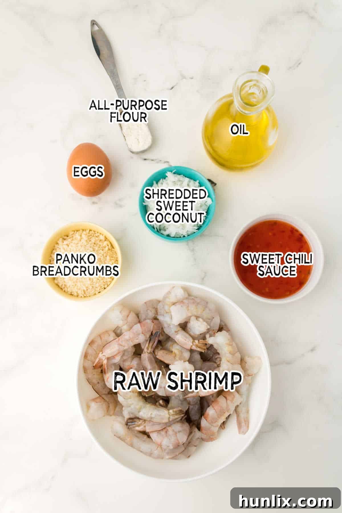 Ingredients on a white marble counter.