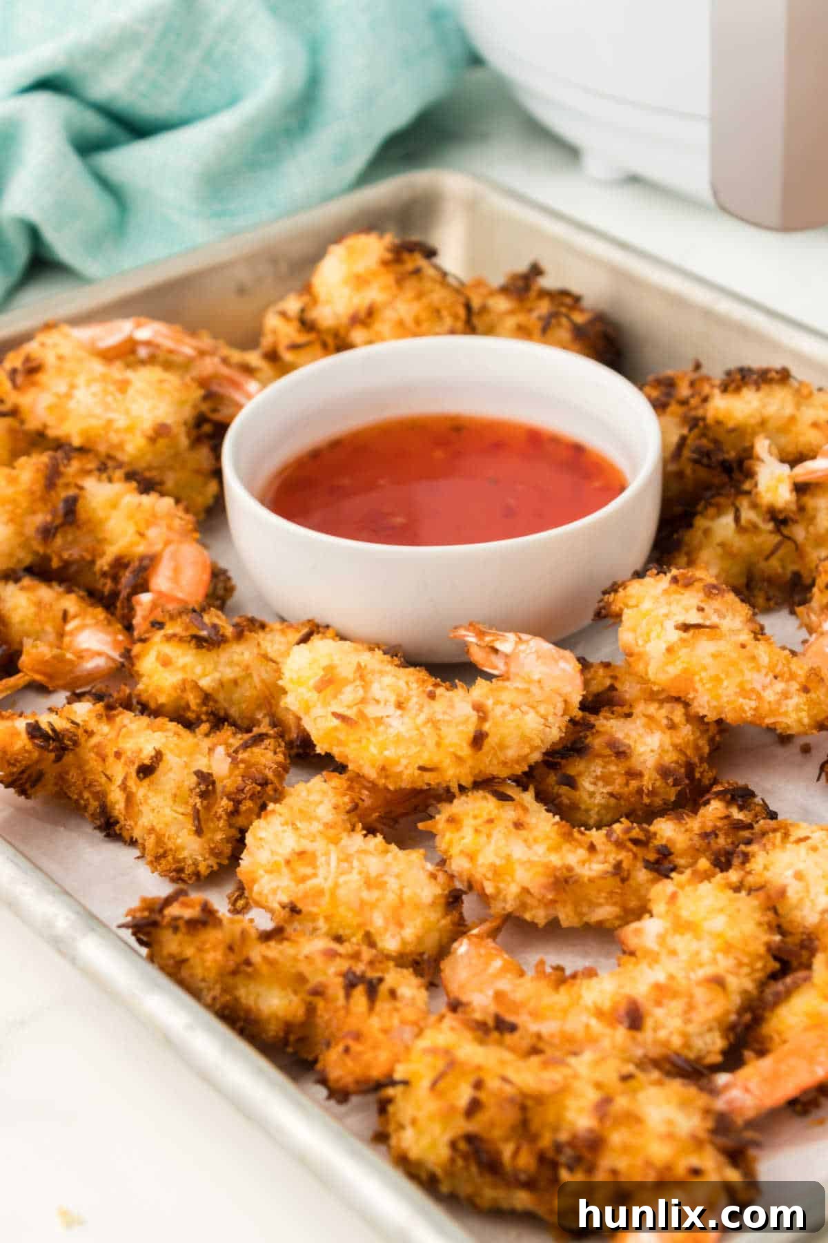 The recipe surrounding a bowl of dipping sauce.