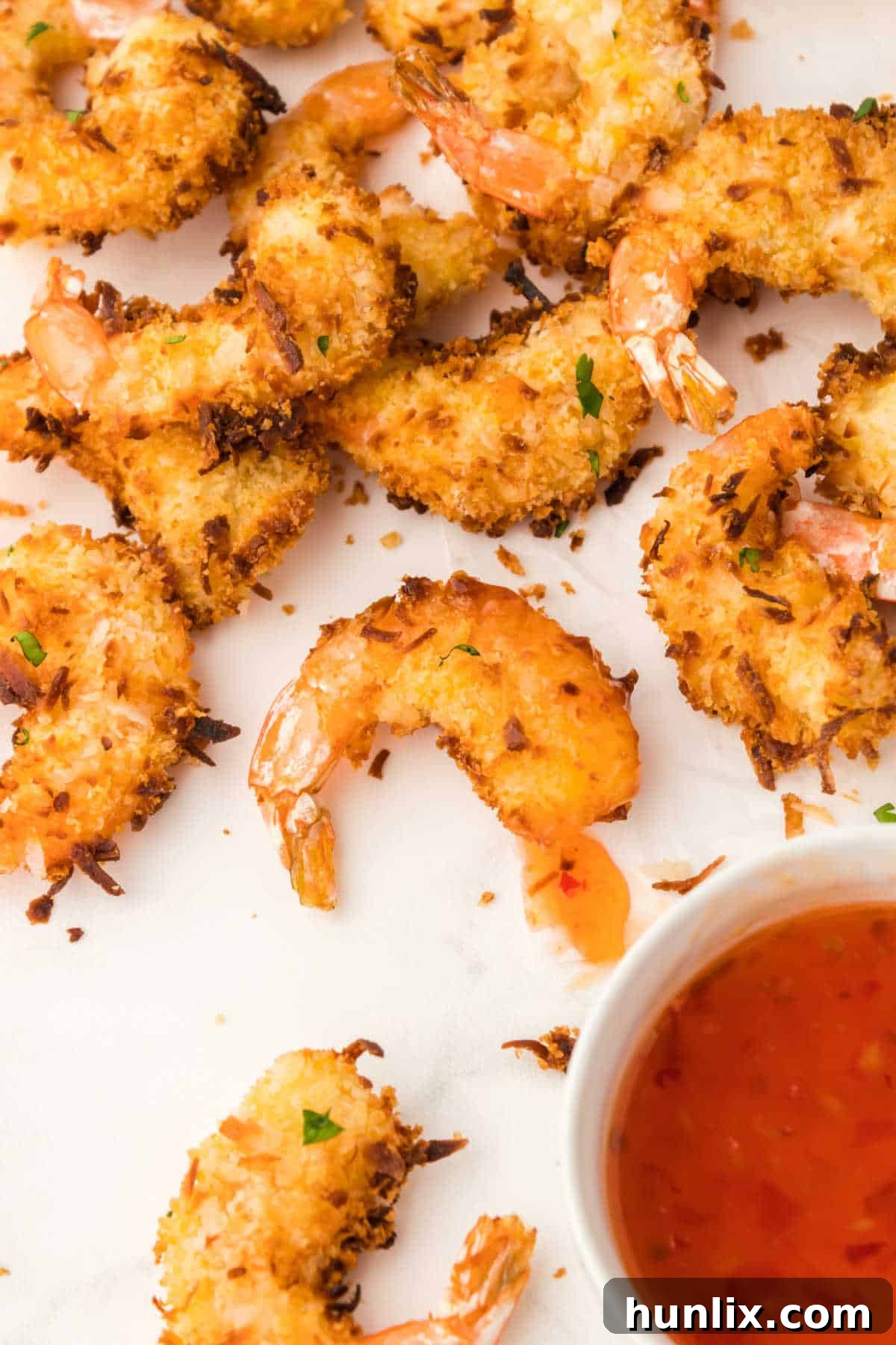 The recipe with a bowl of dipping sauce.