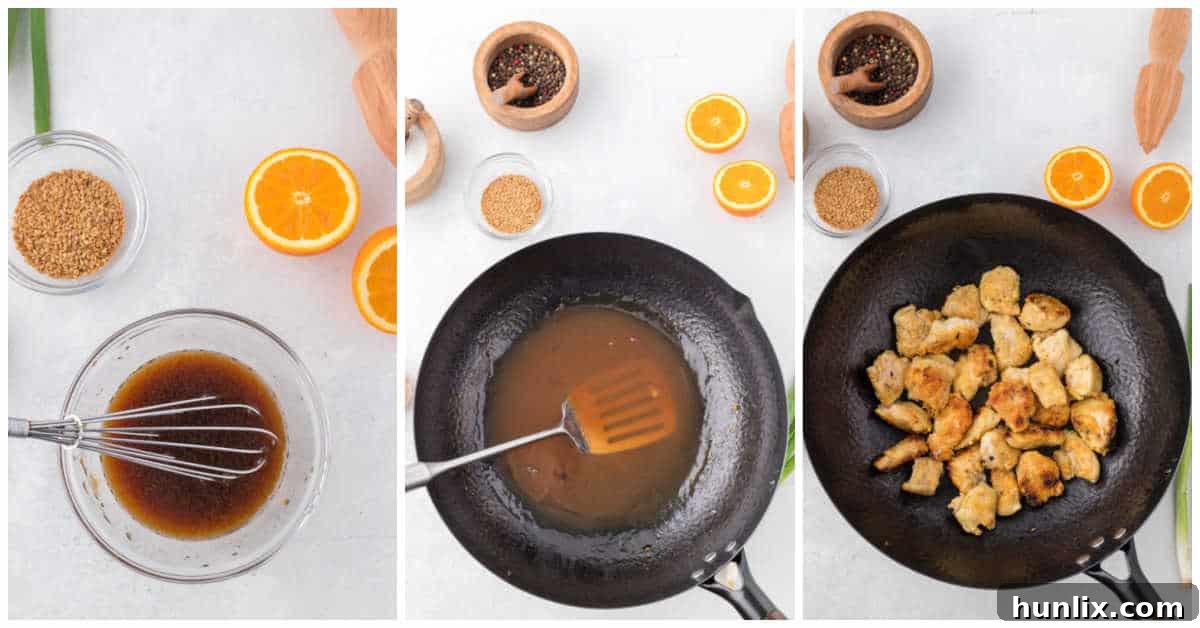 The final stage of orange chicken preparation, with crispy chicken being tossed in a vibrant orange sauce in a wok.