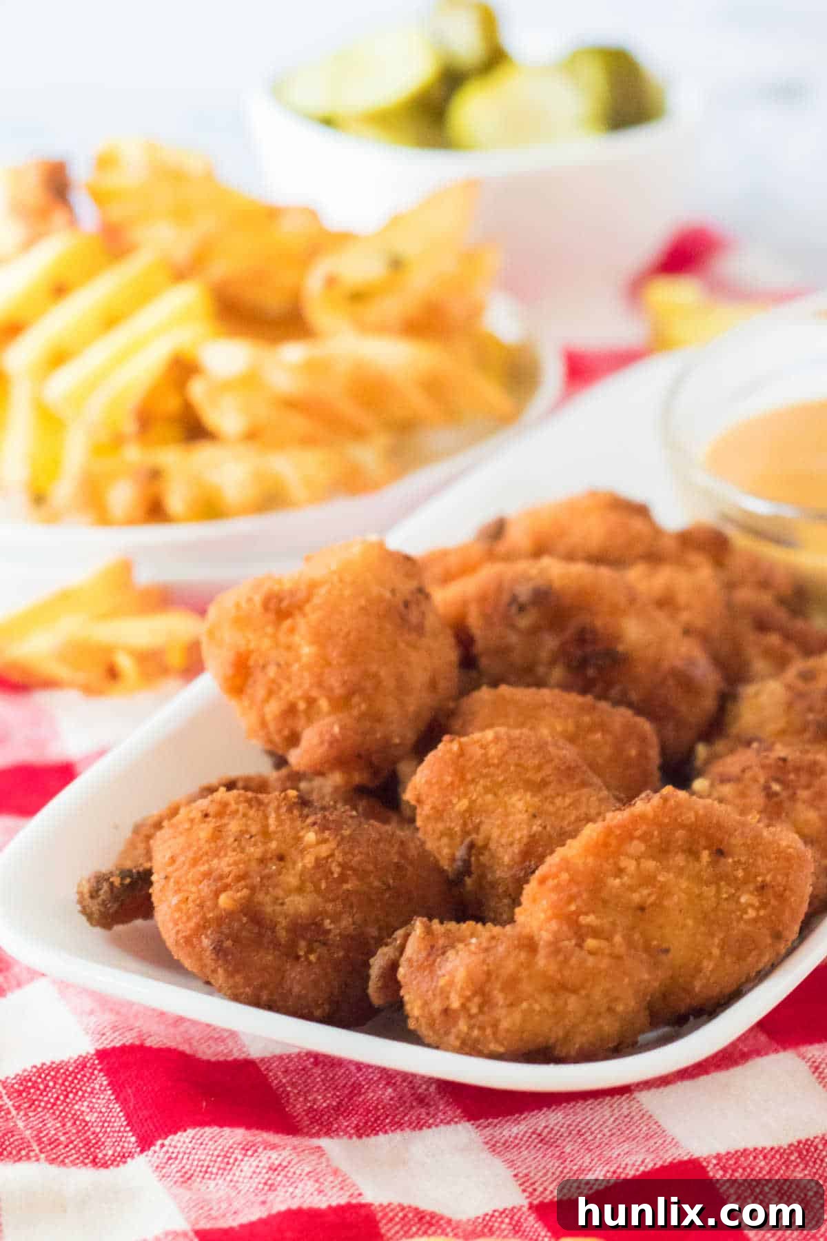The Ultimate Homemade Chick-fil-A Nuggets 2 Crispy homemade Chick-fil-A style chicken nuggets arranged beautifully on a platter, ready to be served.