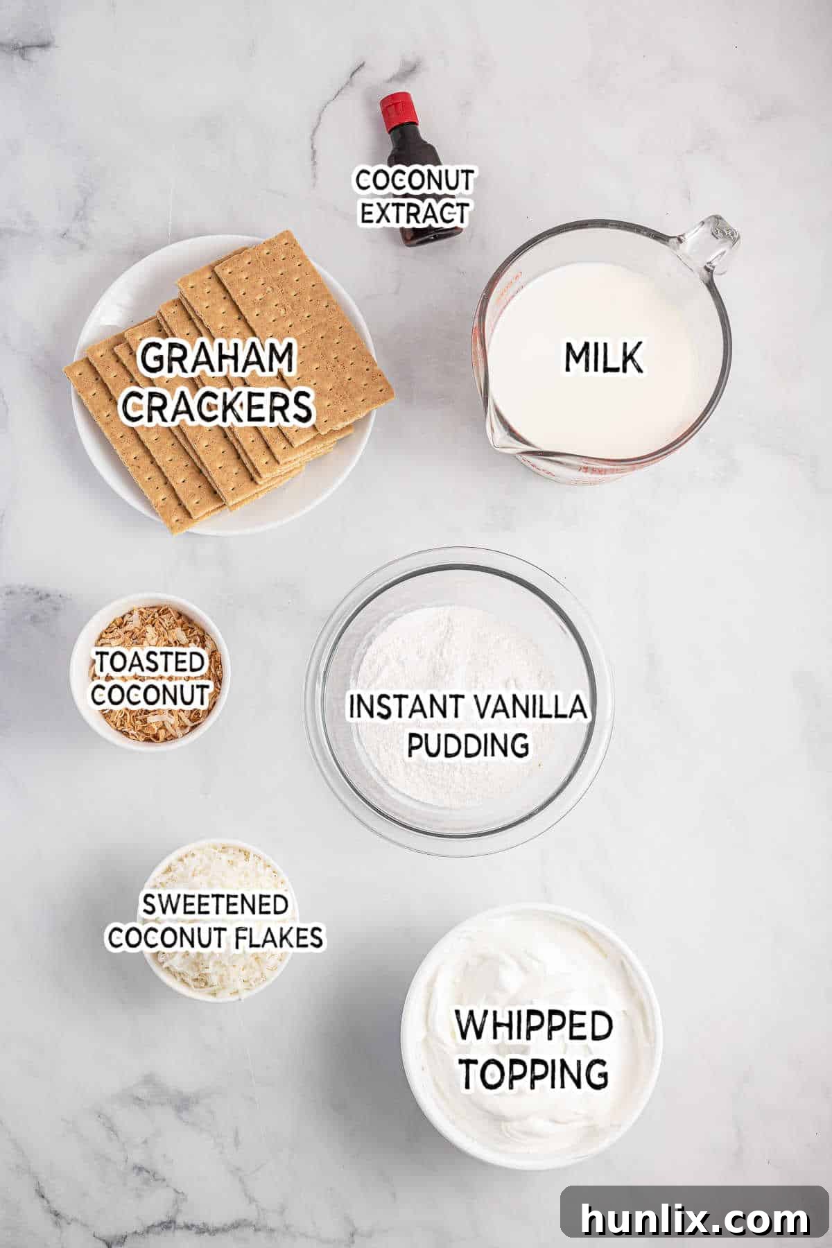 Creamy Coconut Chill Cake 3 Ingredients on a white marble counter.