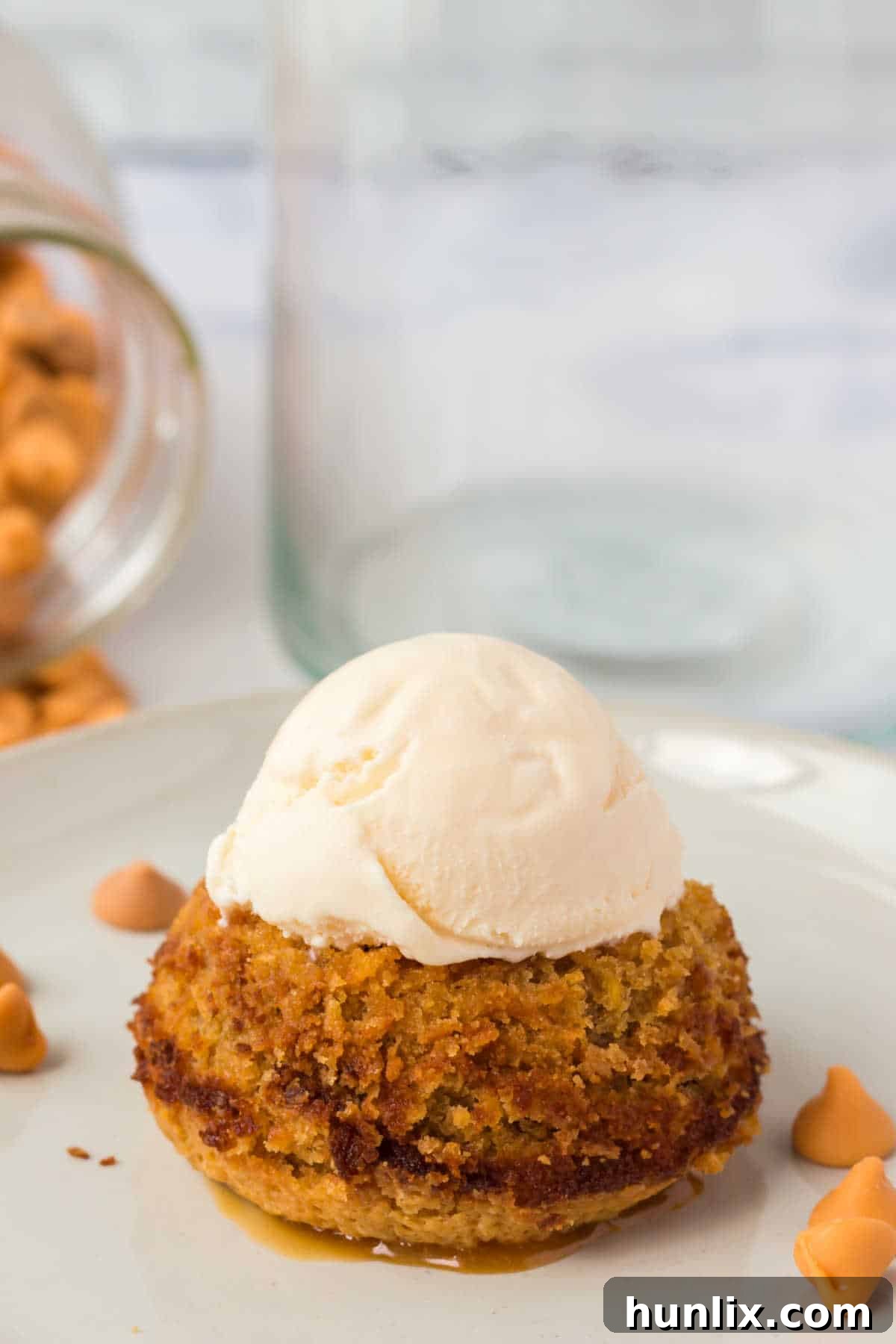 Molten Butterscotch Delights 6 The recipe on a plate topped with vanilla ice cream.