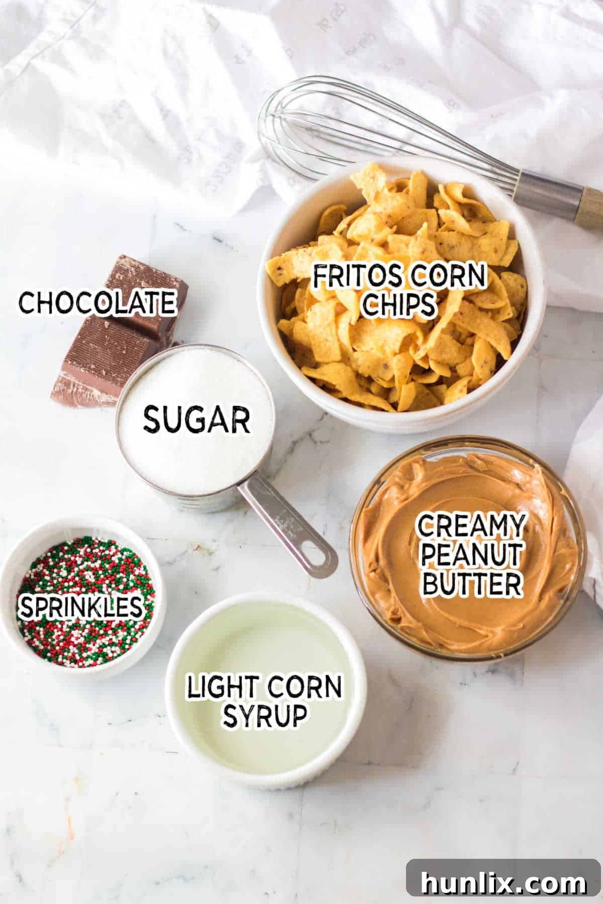 Ingredients for Frito Candy neatly arranged on a white surface.