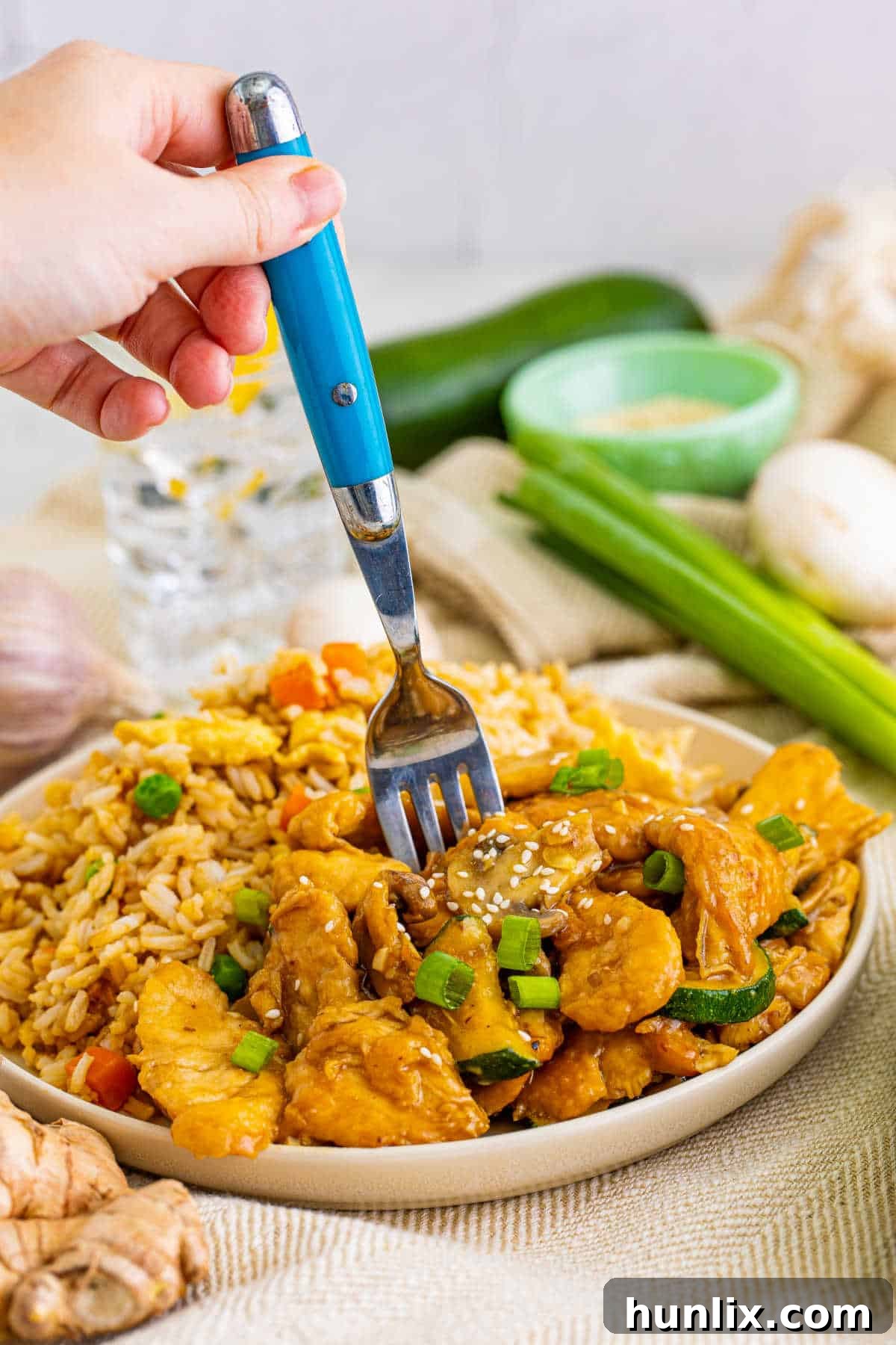 Panda Express Mushroom Chicken - A popular copycat dinner recipe made with tender chicken, veggies and a thick, flavorful ginger garlic sauce. The homemade version is just as good as the original and will soon become a family favorite!