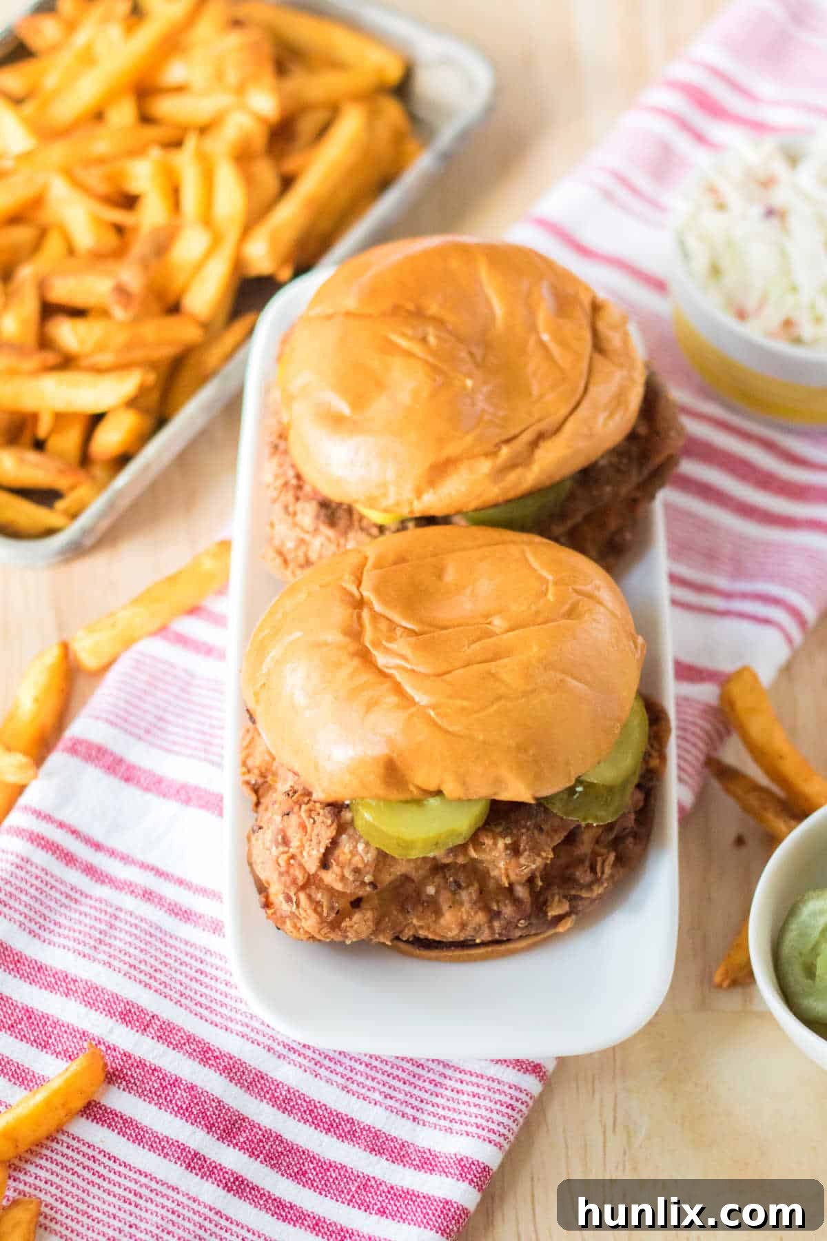 Homemade Popeyes Chicken Sandwich 6 Copycat Popeye's Chicken Sandwich on a platter.