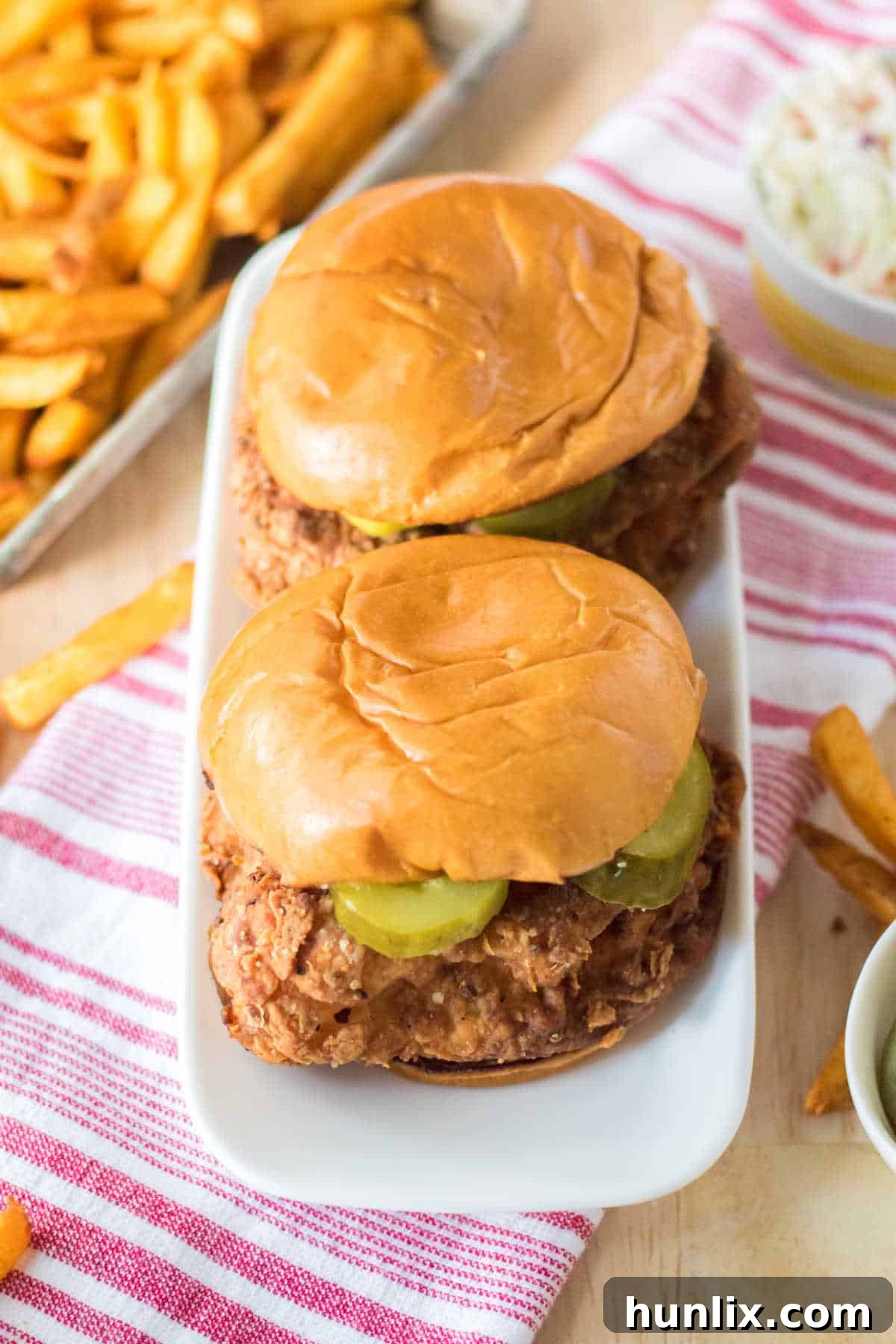 Homemade Popeyes Chicken Sandwich 7 Copycat Popeye's Chicken Sandwich on a platter.