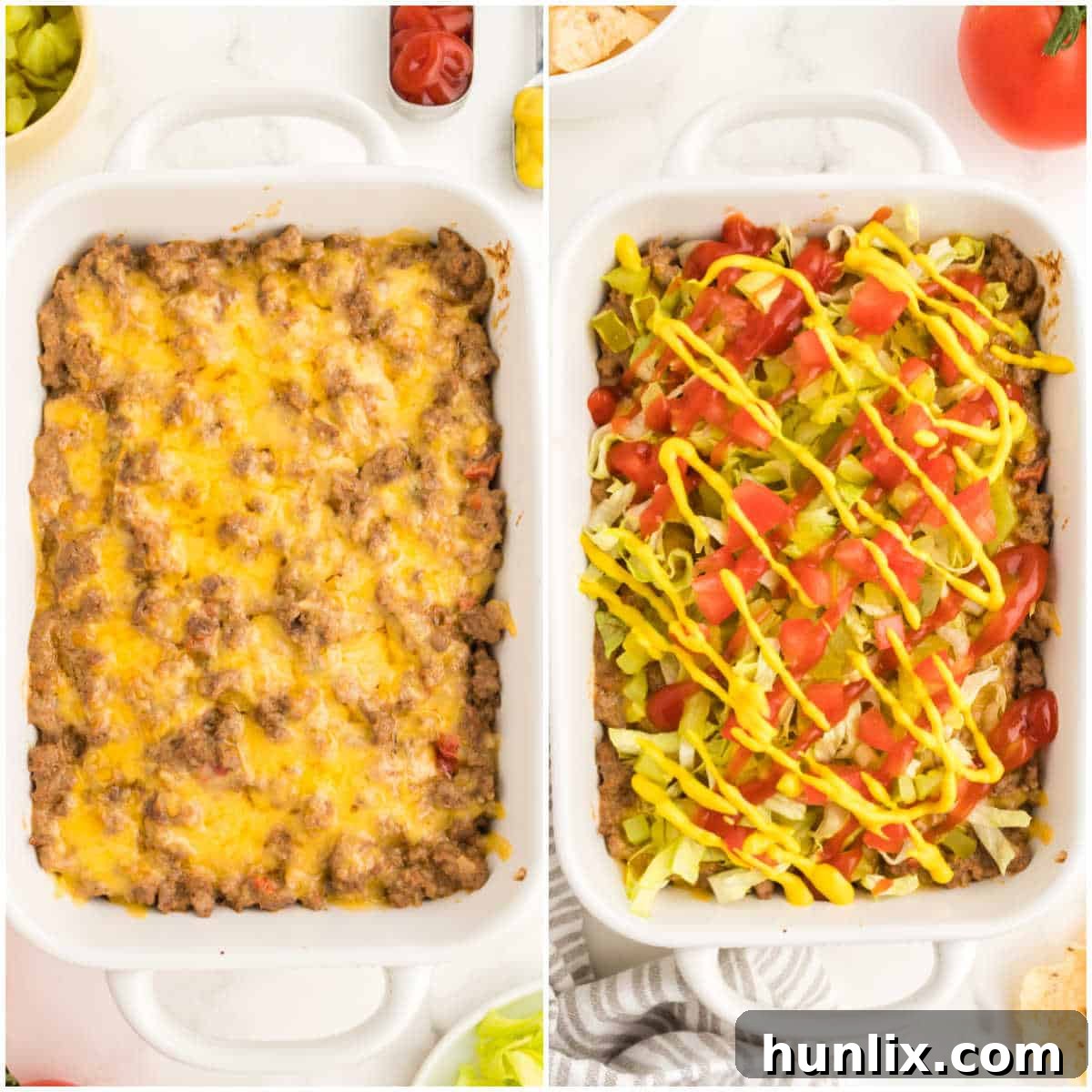A baking dish of hot cheeseburger dip, garnished with fresh lettuce, diced pickles, and tomatoes, with ketchup and mustard drizzled on top, ready for serving.