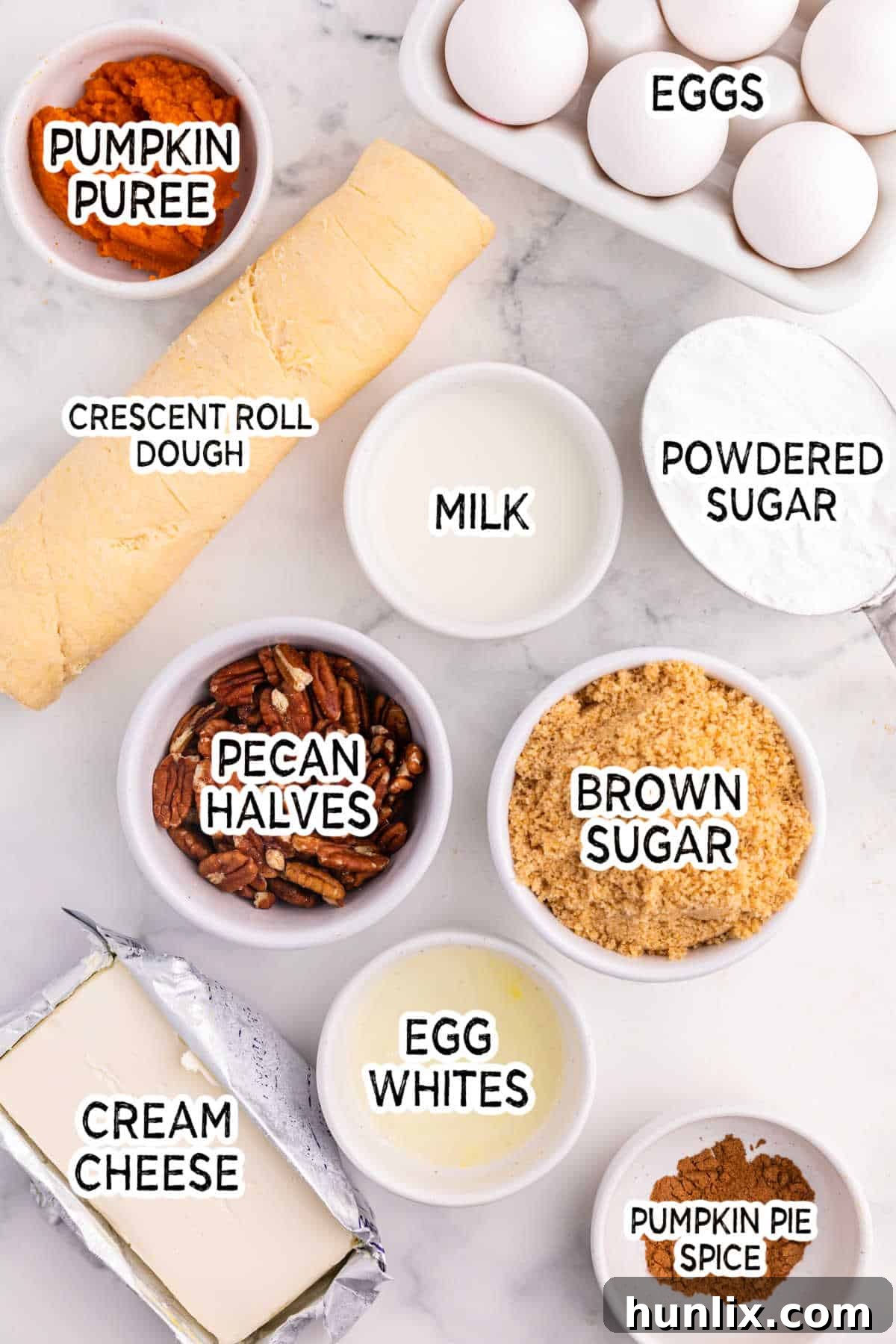 Ingredients on a white marble background.