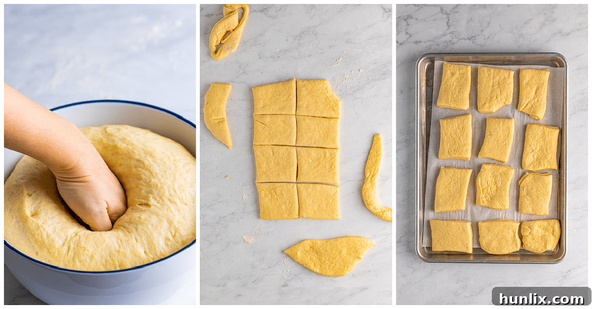 The shaped dough squares placed on a baking sheet, ready for their second rise.