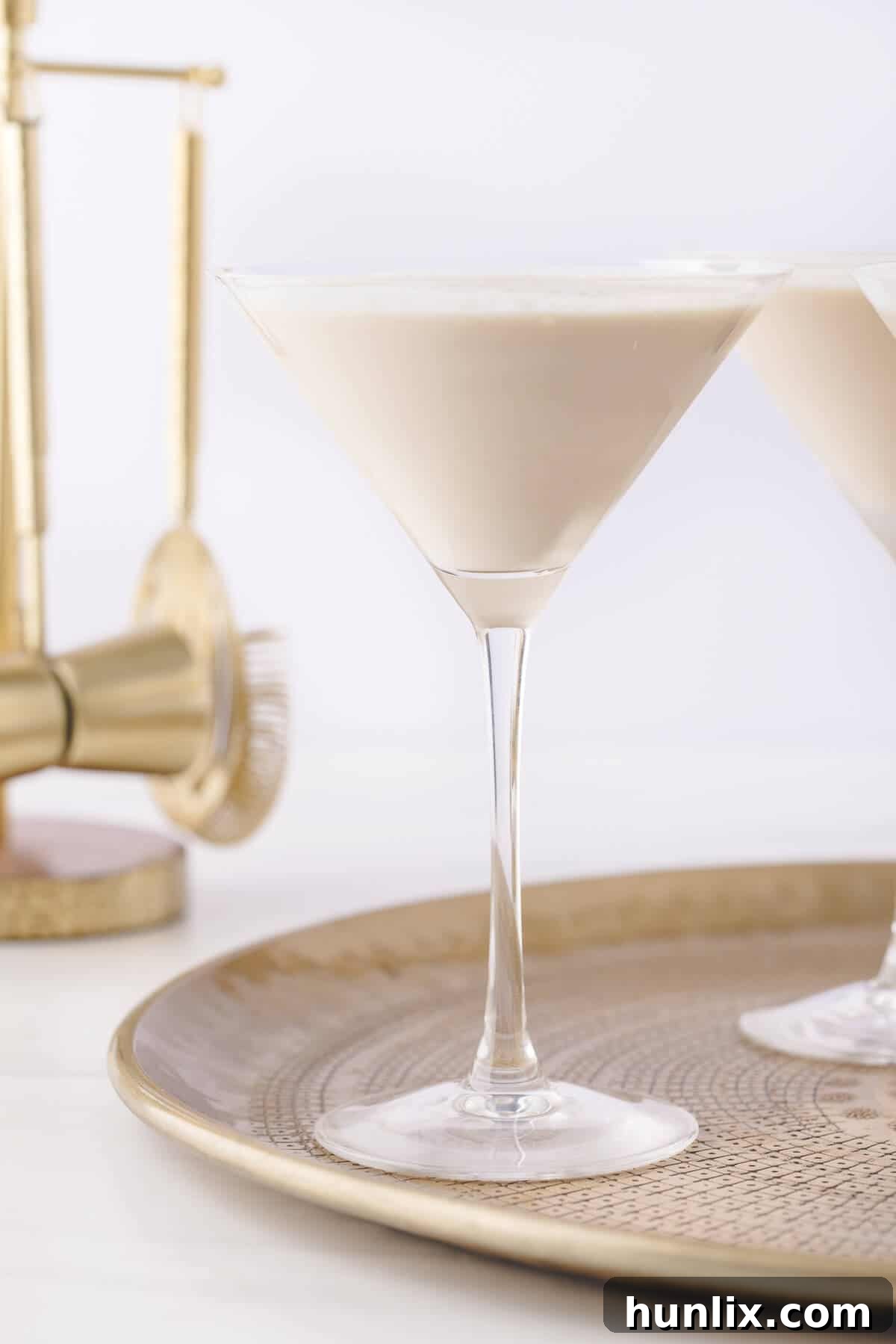 A beautifully arranged gingerbread martini on a gold serving platter, ready for a holiday gathering.