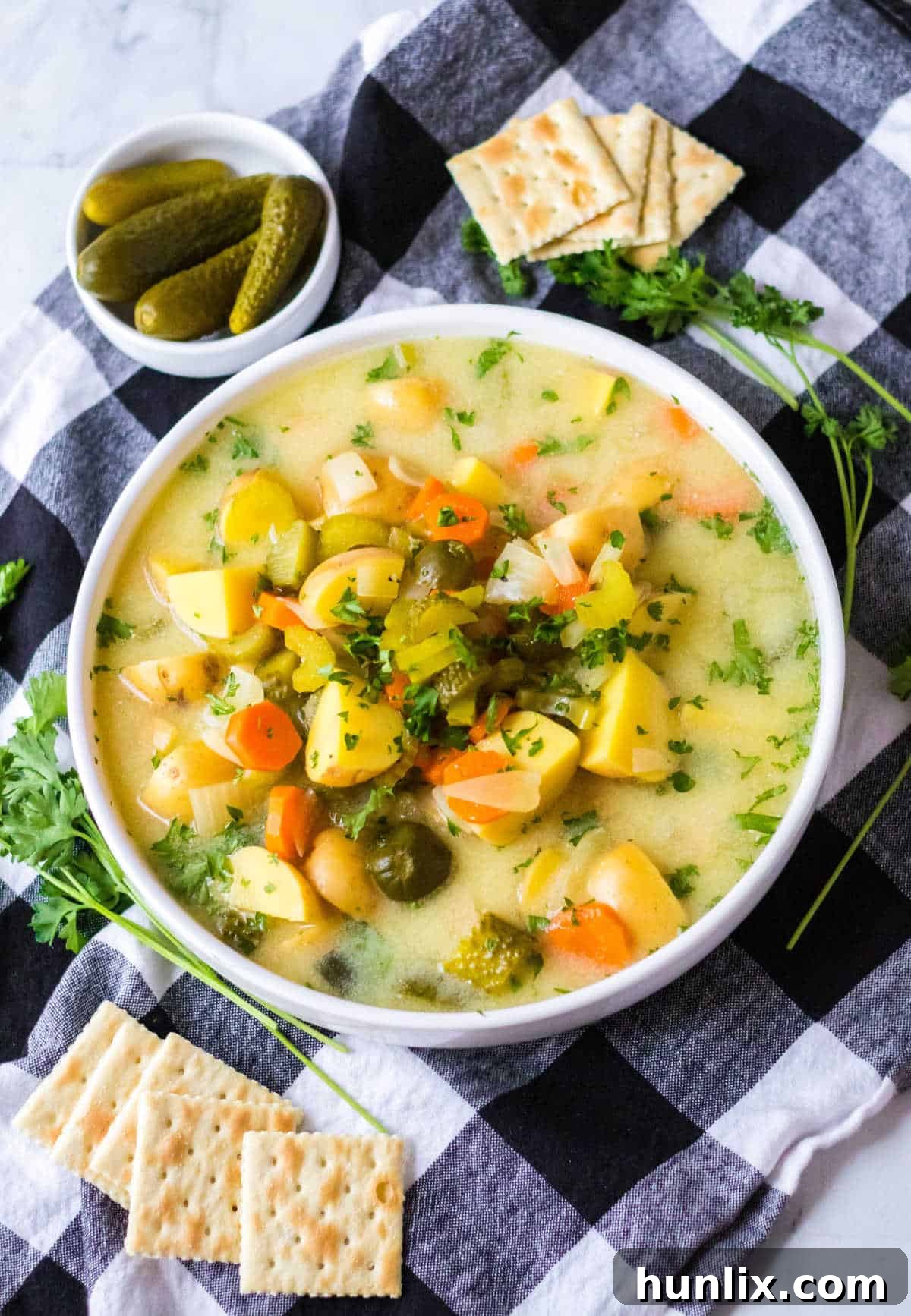 Dill pickle soup in a bowl.