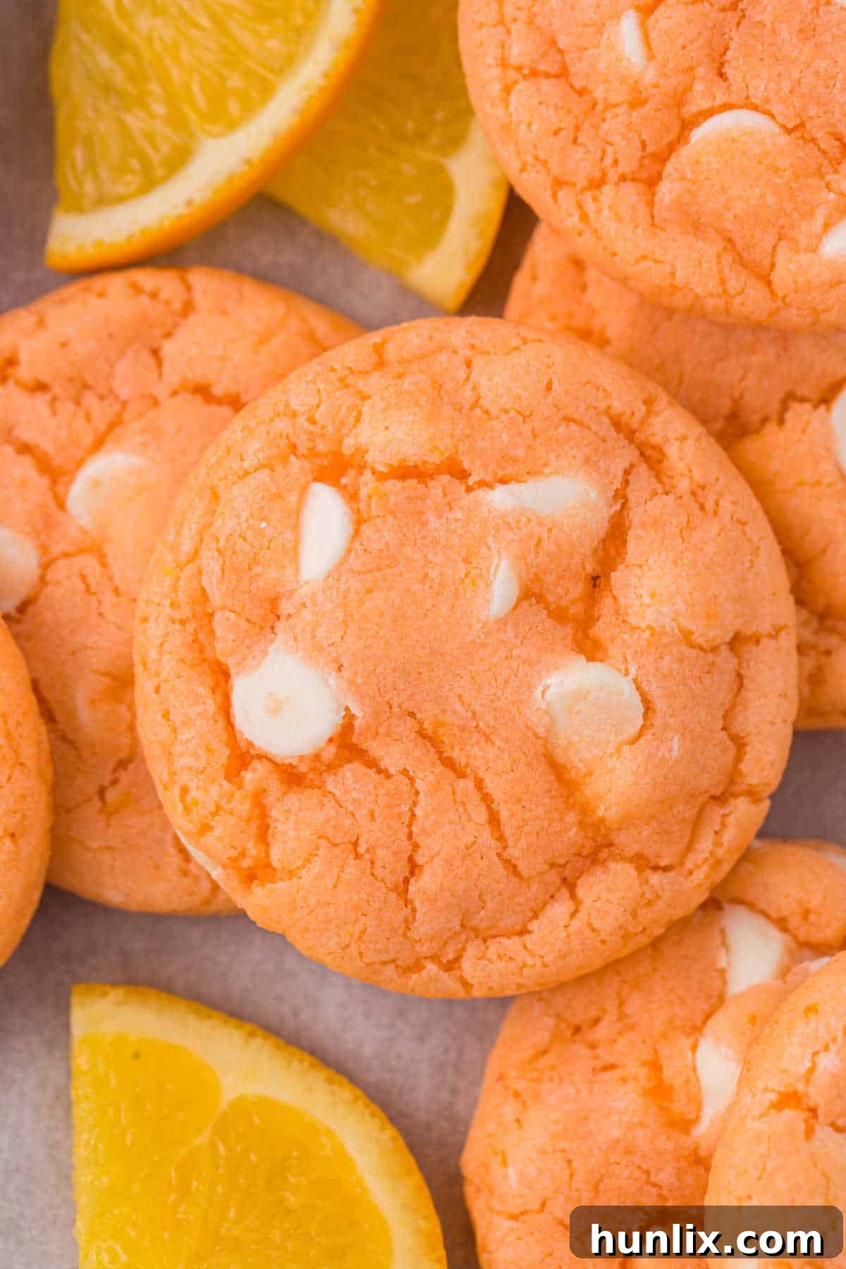 A pile of vibrant orange creamsicle cookies, evoking a sense of nostalgic delight.