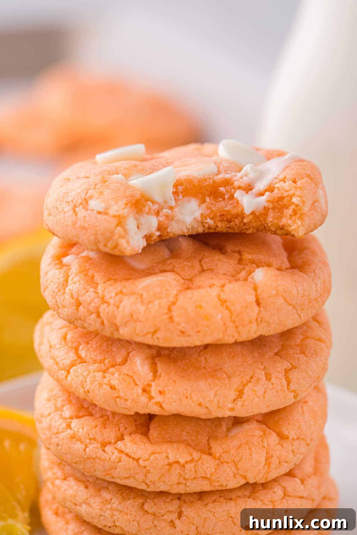 A neat stack of orange creamsicle cookies, ready to be enjoyed.