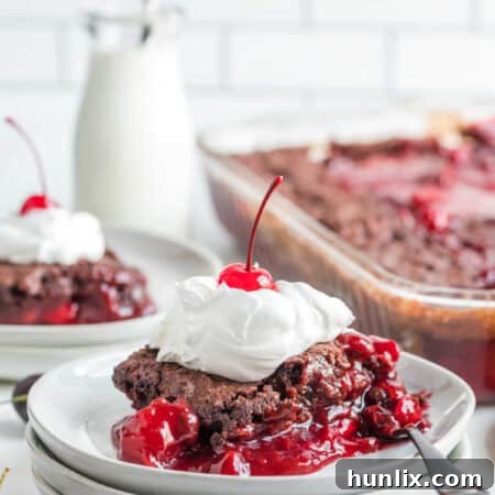 A piece of cake on a plate.