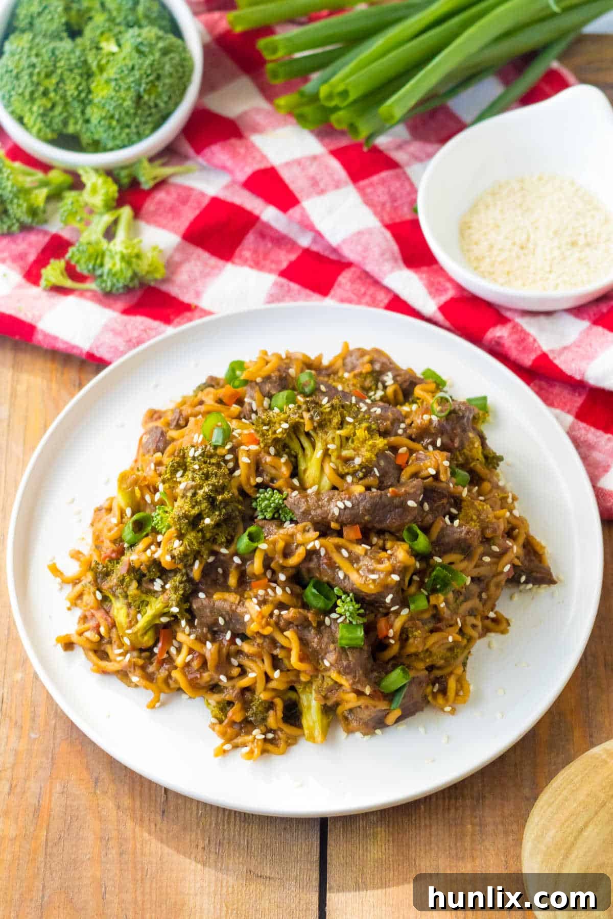 Beef and broccoli ramen on a plate.