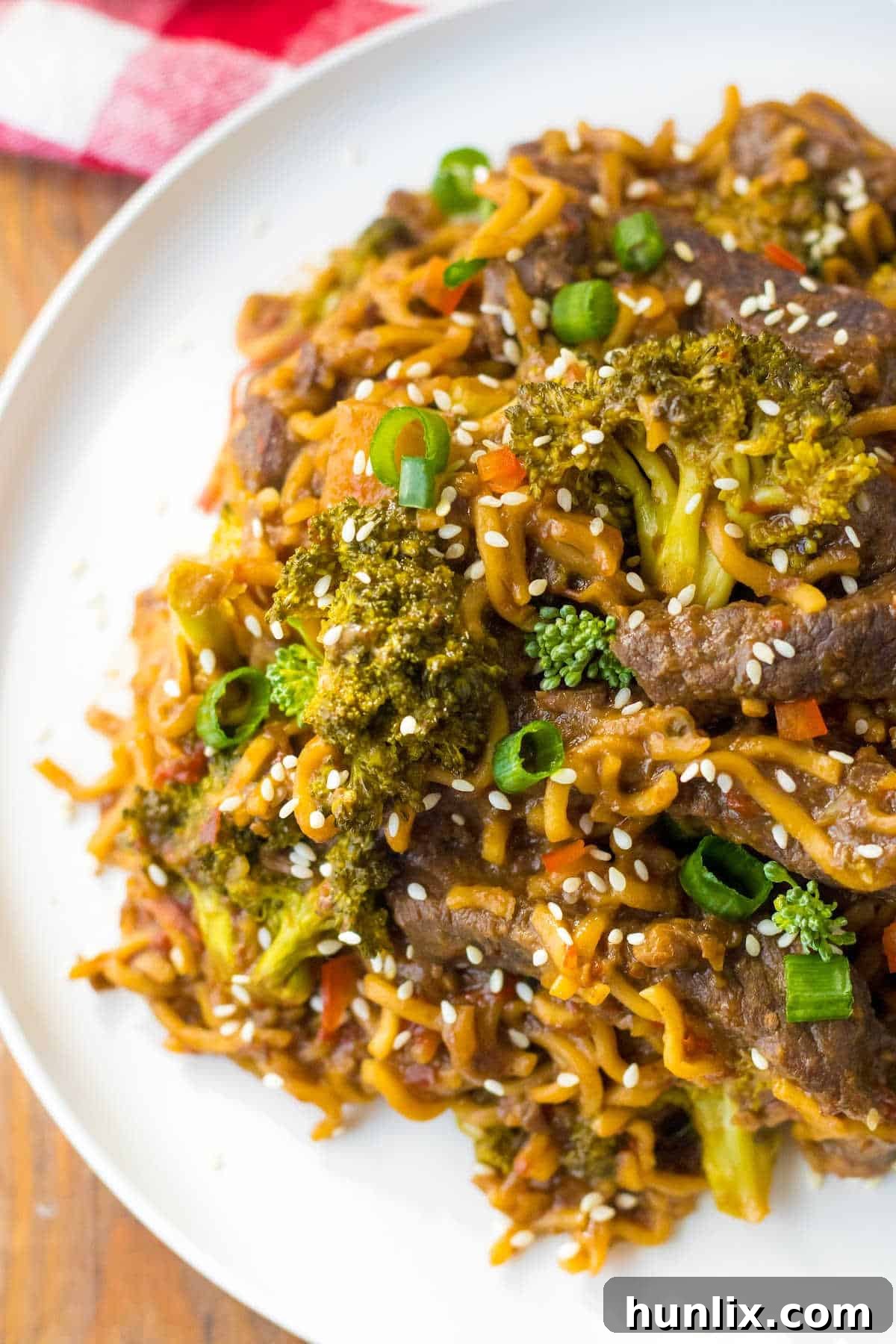 Beef and broccoli ramen on a plate.