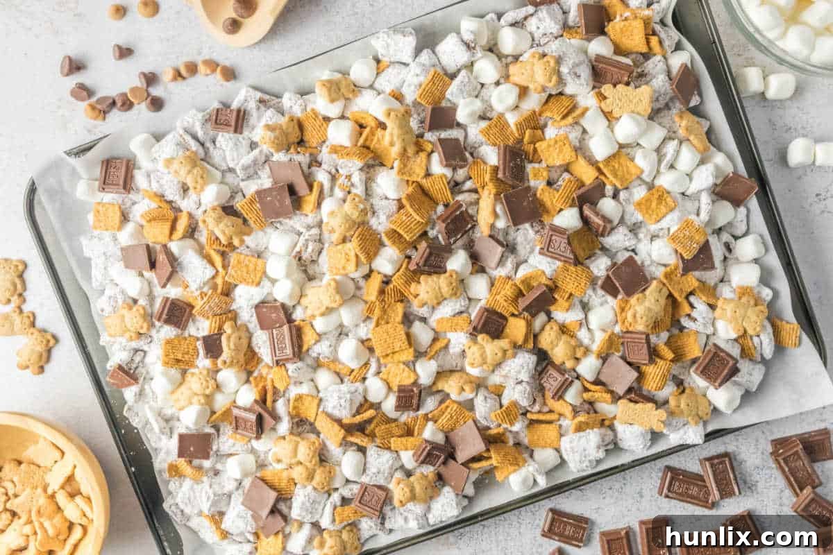 S'mores puppy chow on a baking sheet.