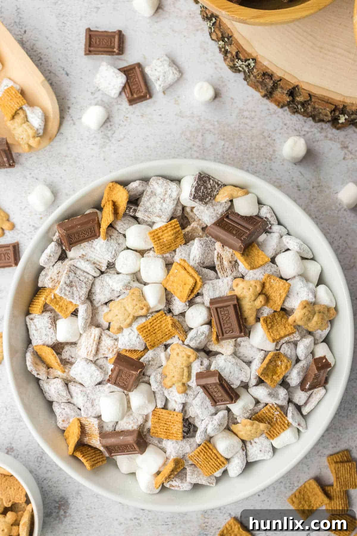 S'mores puppy chow in a white bowl.