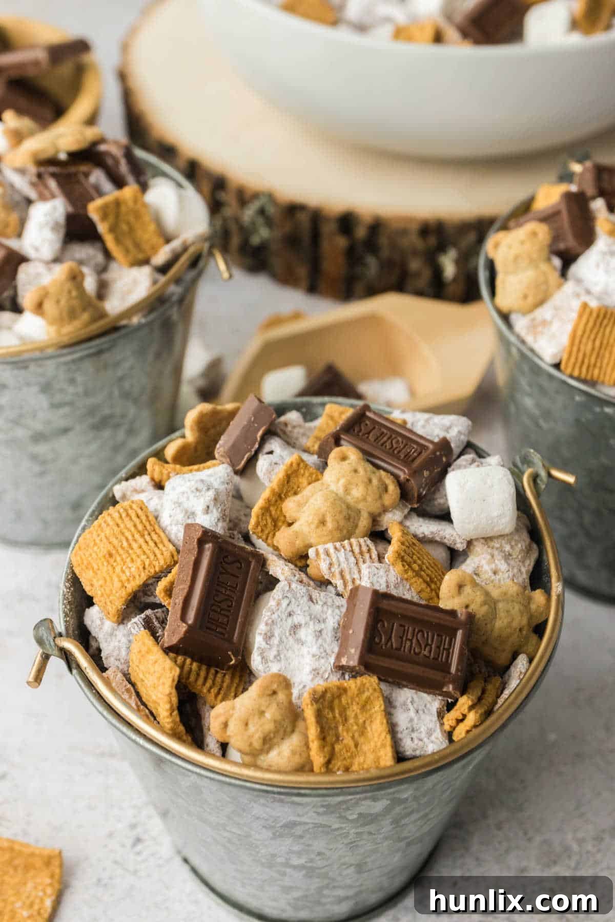 S'mores Puppy Chow in a metal bucket.