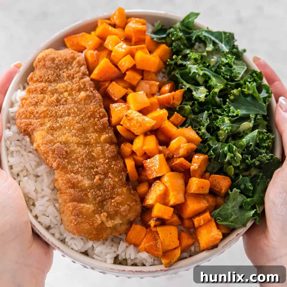 5 Daily Practices for a Vibrant Life 5 Hands holding a haddock buddha bowl.
