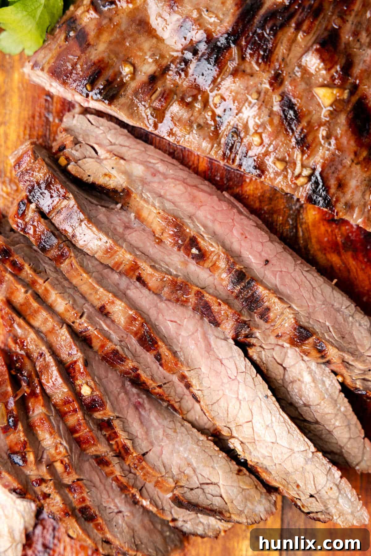 Grilled flank steak cut into slices.